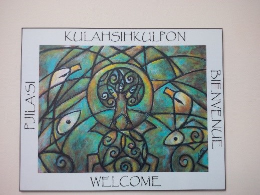 Welcome sign featuring artwork by Wolastoqiyik artist Samaqani Cocahq (Natalie Sappier)